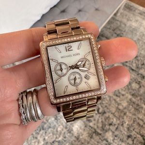 Michael Kors | Rose gold rectangular watch with opal face